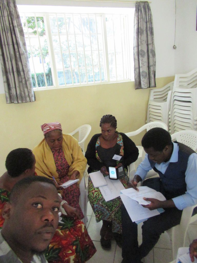 Séance de formation avec prise de notes des participants
